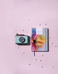 blue and black point-and-shoot camera thumbnail