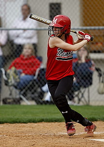 woman swinging baseball bat thumbnail
