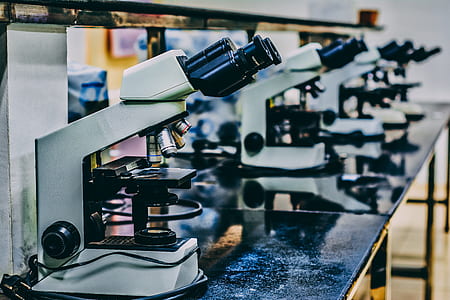 selective focus photography of white and black microscope thumbnail