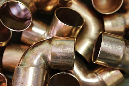 closeup photo of brass-colored pipe lot thumbnail