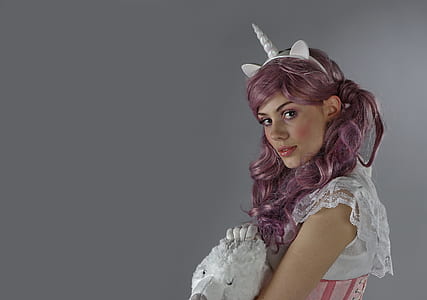woman wearing unicorn Alice band thumbnail