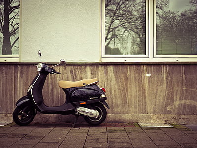 black motor scooter thumbnail