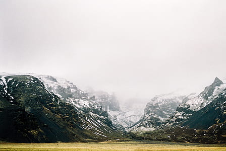 landscape photography of snow covered mountain with fogs thumbnail