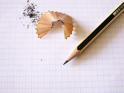 yellow and black pencil on graphing paper thumbnail