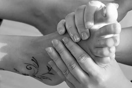 person massaging foot thumbnail