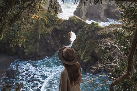 woman staring at the body of water thumbnail