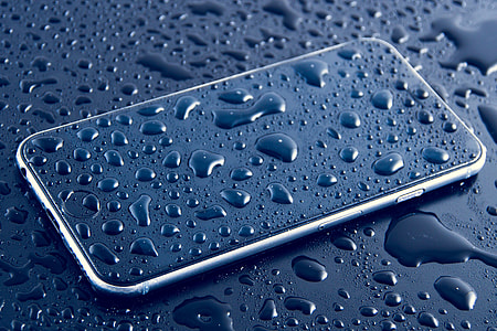 Wet mobile iPhone smartphone with water drops thumbnail