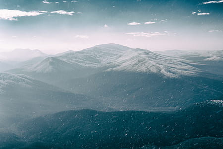 aerial view of mountains during winter thumbnail