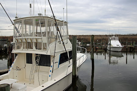 Small fishing boat moored at a marina in Point Pleasant New Jersey. thumbnail