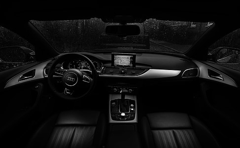 grayscale photo of vehicle interior thumbnail