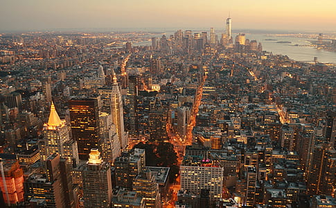 aerial photo of gray concrete buildings during daytime thumbnail
