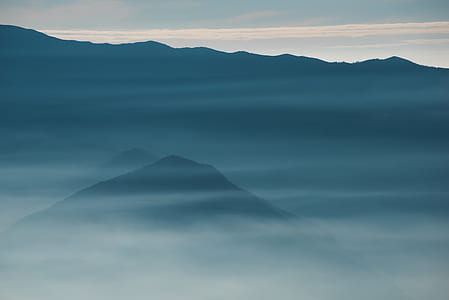 mountain summit with fogs thumbnail