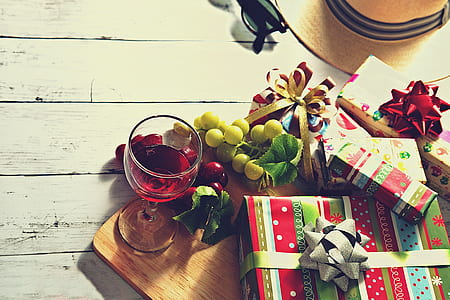 wine glass on brown wooden board thumbnail