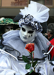 person wearing white and black face mask thumbnail