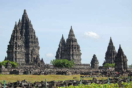 landscape photography of three black temples thumbnail