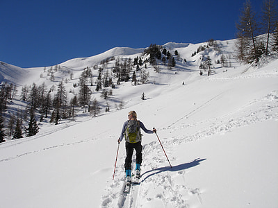 man walking on snow field thumbnail