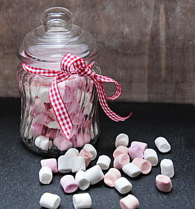 jar of marshmallows on black surface thumbnail