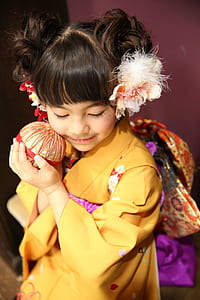girl wearing yellow floral kimono dress thumbnail