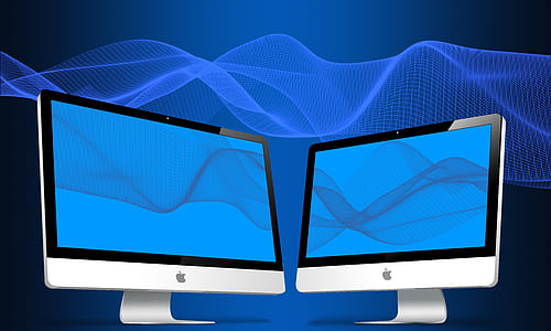 two silver iMac's thumbnail