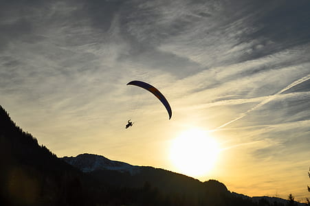 person using parachute during daytime thumbnail