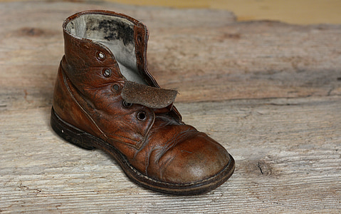 unpaired brown leather boot thumbnail