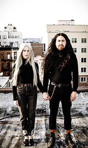 man and woman holding each other hands thumbnail
