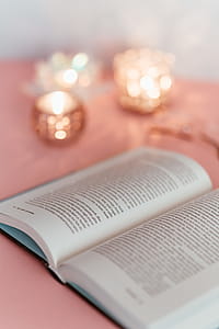 Open book on a pink background thumbnail