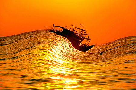 sailing boat floating on body of water photograph thumbnail
