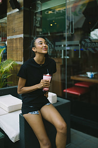 woman wearing black crew-neck shirt thumbnail