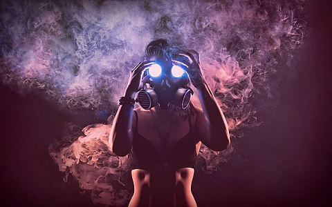 Woman in a black bra in gas mask thumbnail