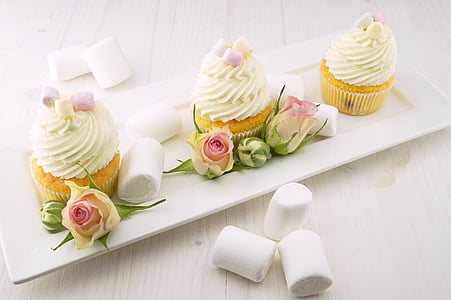 three cupcakes on plate with marshmallows thumbnail