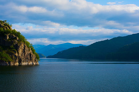 body of water and mountain thumbnail