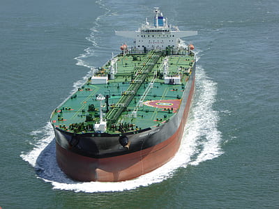 black and green cargo carrier on body of water thumbnail