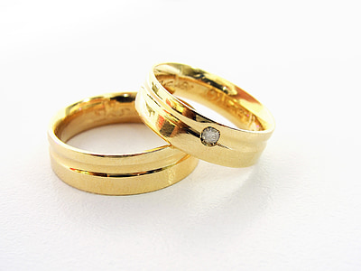 gold-colored couple rings thumbnail