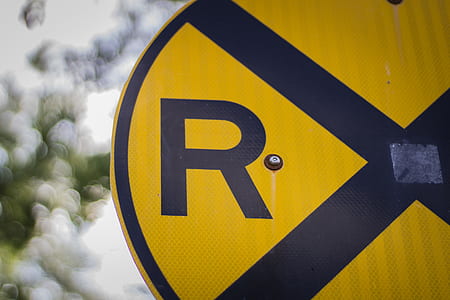 yellow and blue letter R road signage thumbnail