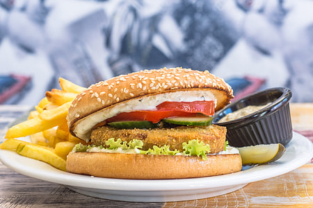 hamburger and French fries on plate thumbnail