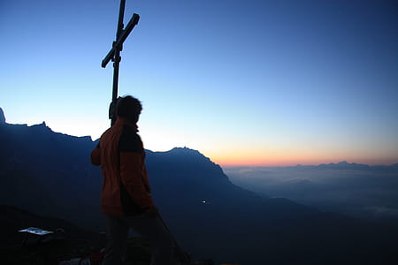 person carrying cross thumbnail