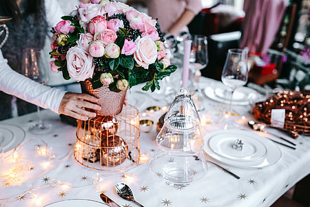 Hands Decorating Christmas Table thumbnail