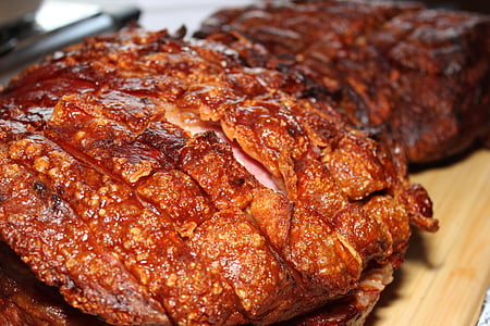 close-up of cooked meat on brown surface thumbnail