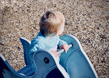 boy on top playground toy thumbnail