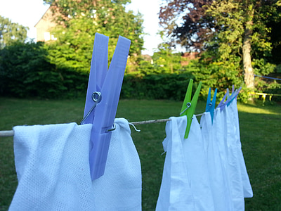 white textile hanging at daytime thumbnail