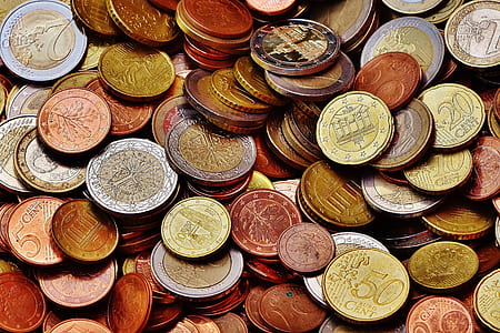 pile of assorted-denomination coins thumbnail