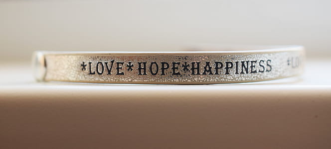 selective focus photo of a silver-colored quoted accessory thumbnail