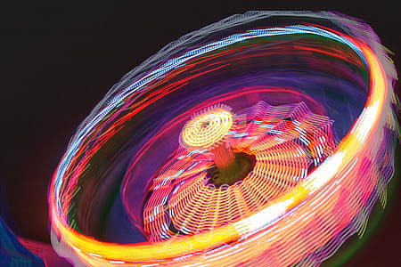time lapse photography of multicolored amusement ride thumbnail