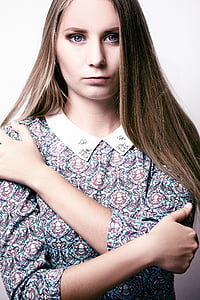 woman wearing blue and pink dress thumbnail