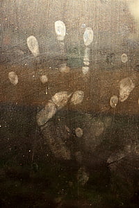 hand dirt print on glass thumbnail