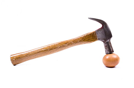 beige claw hammer on brown stone thumbnail