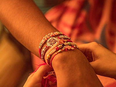 person wearing beaded bracelets thumbnail