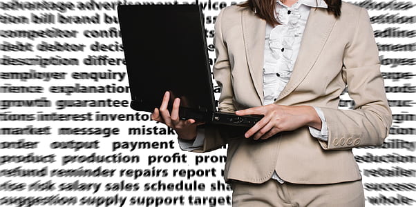 woman holding laptop photo thumbnail