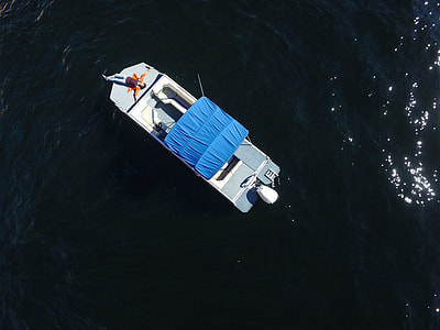 person lying on boat thumbnail